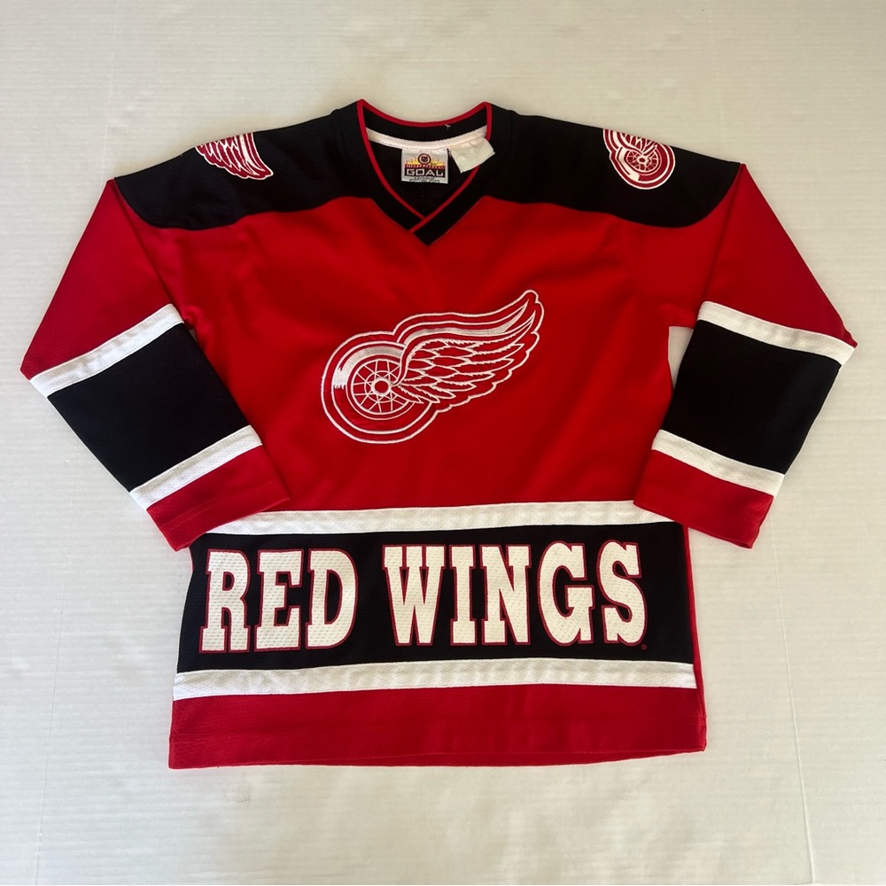 Vintage Detroit Red Wings jersey kids size medium early 90s made in America.